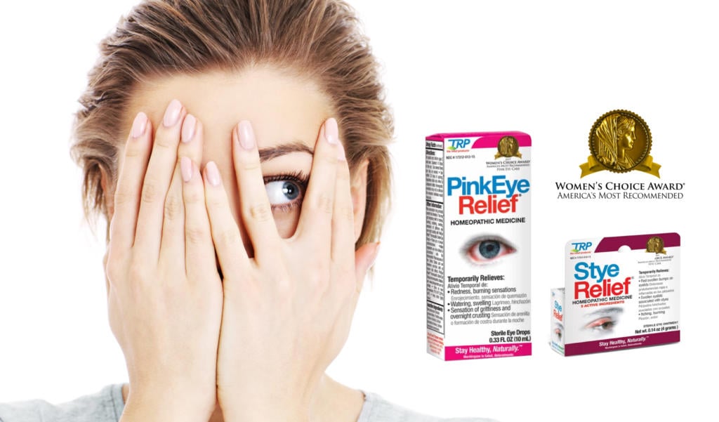 woman looking at pinkeye relief box